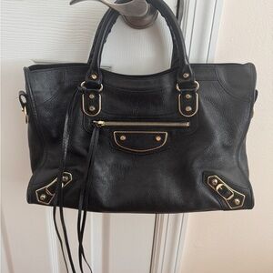 AUTHENTIC Balenciaga top handle leather bag with gold accents